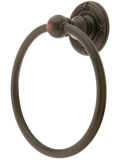 Brass Towel Ring with Ribbon and Reed Rosette in Oil Rubbed Bronze.